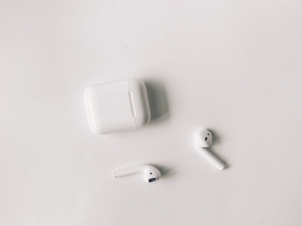 White Apple Airpods on White Table